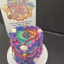 Colorful heart birthday cake from Kiss Me Cakes